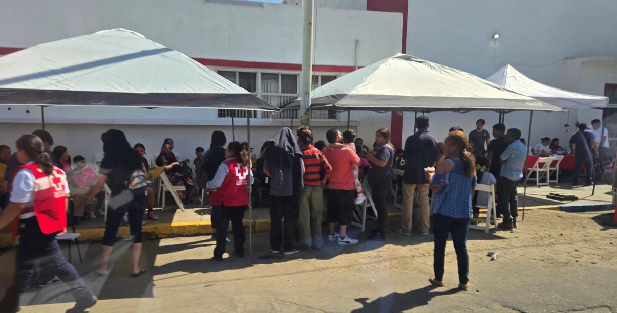  Patients & their parents waiting in line before we arrive on Thursday 12 noon